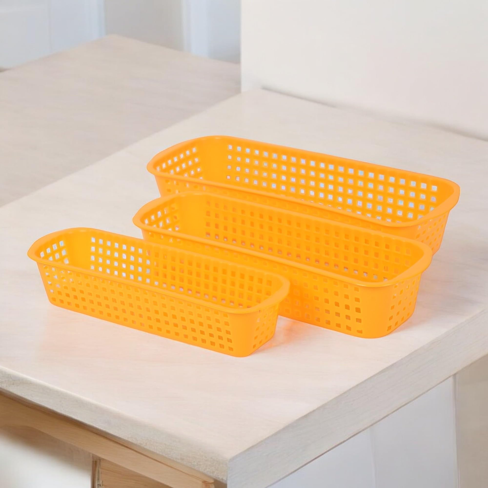 GoHooked set of 3 yellow rectangular plastic drawer organizers with perforated sides for multipurpose storage.