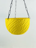 GoHooked yellow plastic hanging planter with woven texture and black chain. Ideal for indoor or outdoor use.