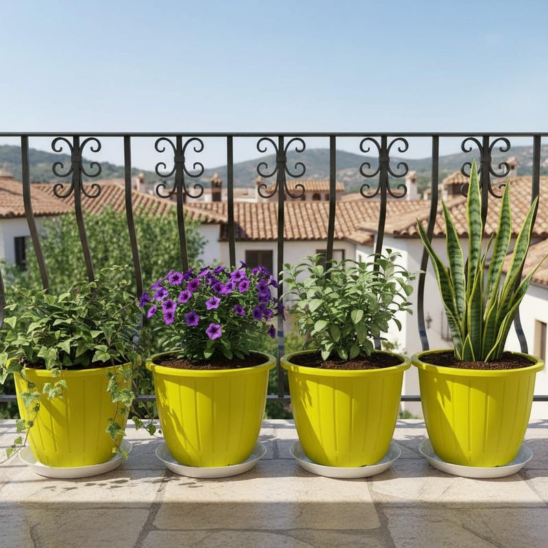GoHooked yellow 8-inch plastic planters with trays, holding various plants on a balcony.
