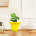 GoHooked yellow plastic planter pot with saucer, 6 inch twister design for indoor/outdoor plants.