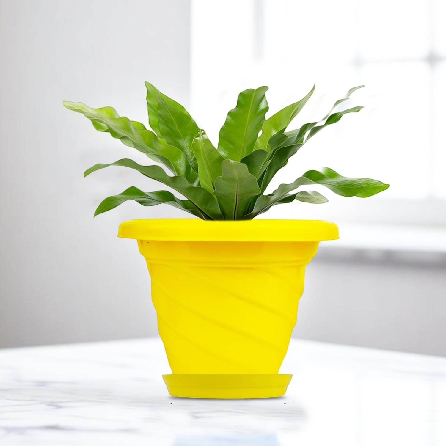 GoHooked yellow plastic planter pot with saucer, 6 inch twister design for indoor/outdoor plants.