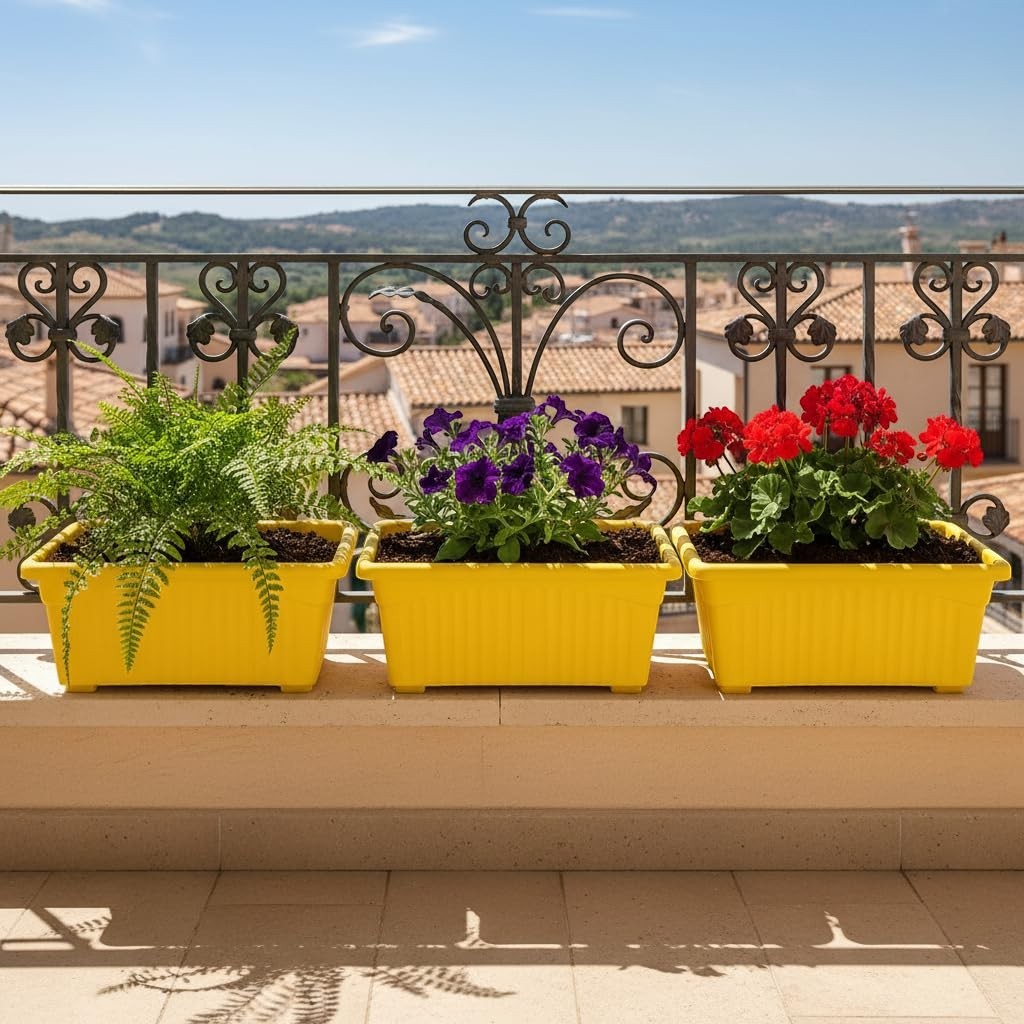 GoHooked Set of 3 yellow rectangular plastic planters with plants on a balcony railing.