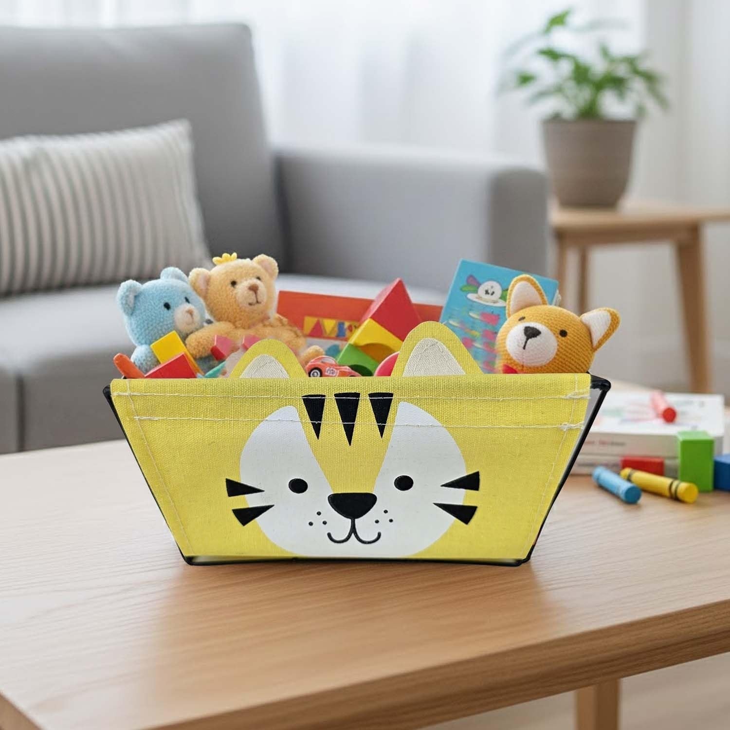 GoHooked yellow metal wire storage basket with cute tiger face design and detachable fabric liner, filled with toys.