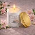 ViMe white glass jar candle with lasting lily scent, hand-poured for home decor and aromatherapy.