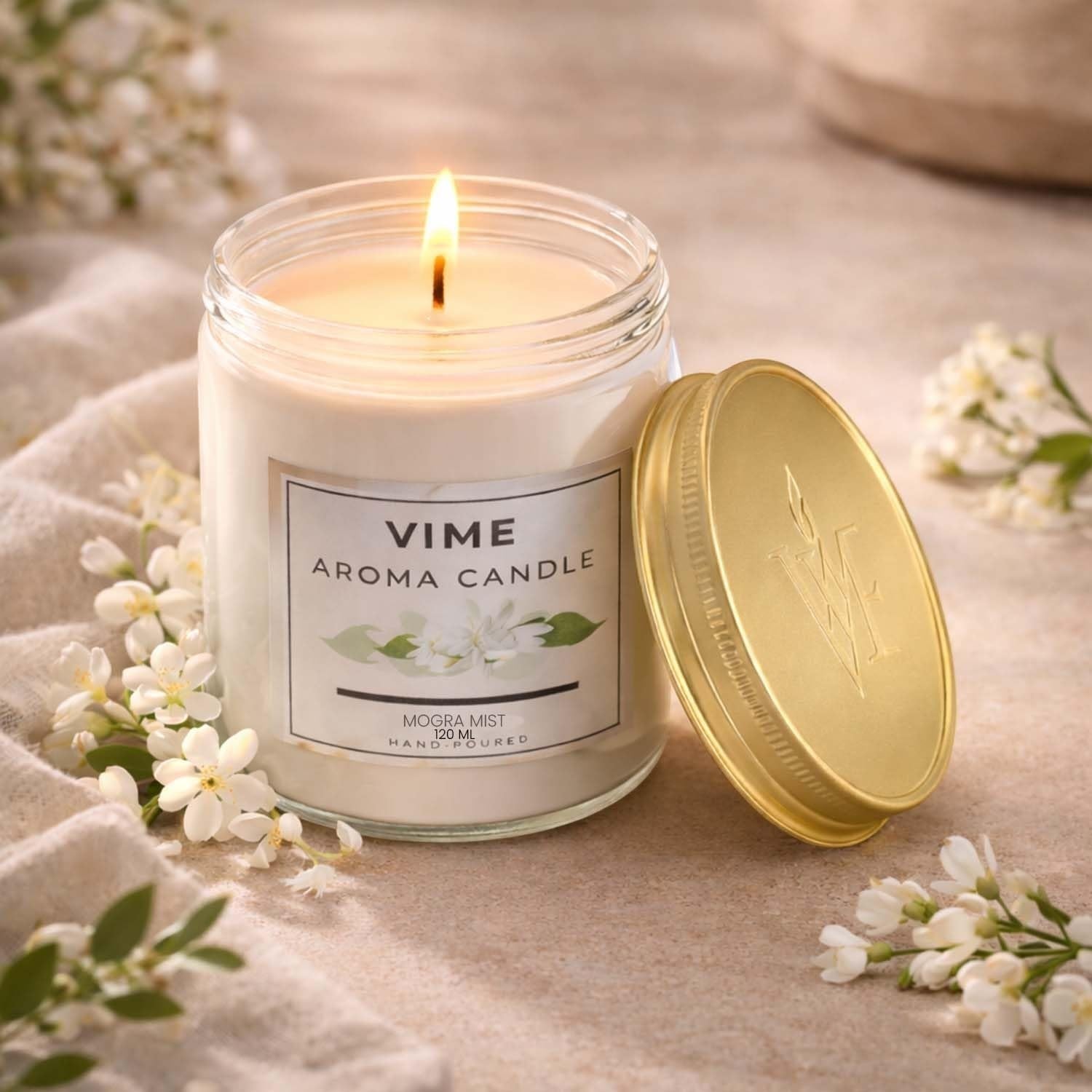 ViMe white aroma candle in a glass jar with a gold lid, featuring a Mystic Musk Ralph fragrance. Hand-poured wax.