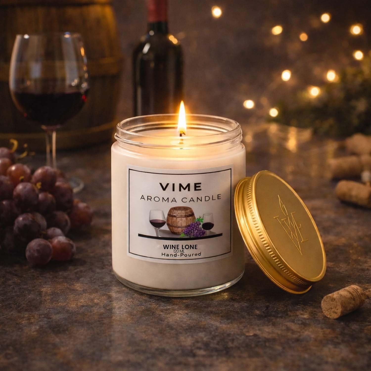 ViMe white wax aroma candle in a glass jar with a gold lid, featuring a label with wine imagery. Hand-poured.